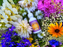 Load image into Gallery viewer, DreamSicle Sleep Formula CBD oil among colorful flowers
