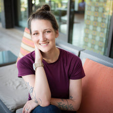 Load image into Gallery viewer, Portrait of a retreat facilitator seated outdoors